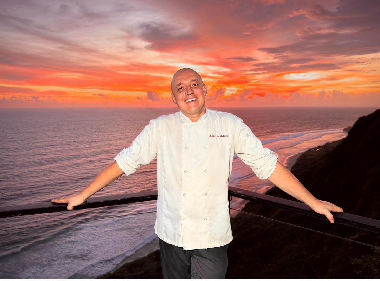 Head Chef Andrey Legkiy at Rockfish Cliffside with sunset over Indian Ocean