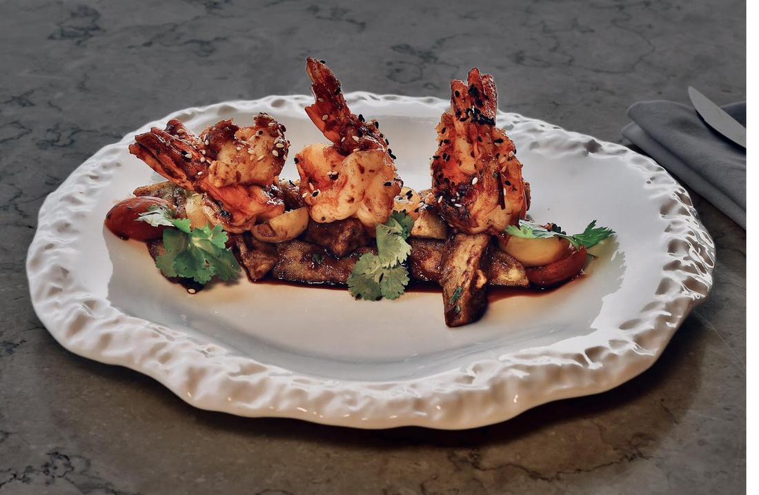 Grilled jumbo prawns with sesame and eggplant at Rockfish Cliffside
